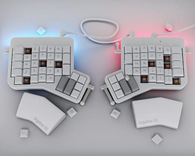 White DSA keycaps on two halves of an Ergodox-ez