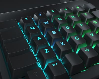 Close up of black backlit keycaps on the left side of an Ergodox-ez